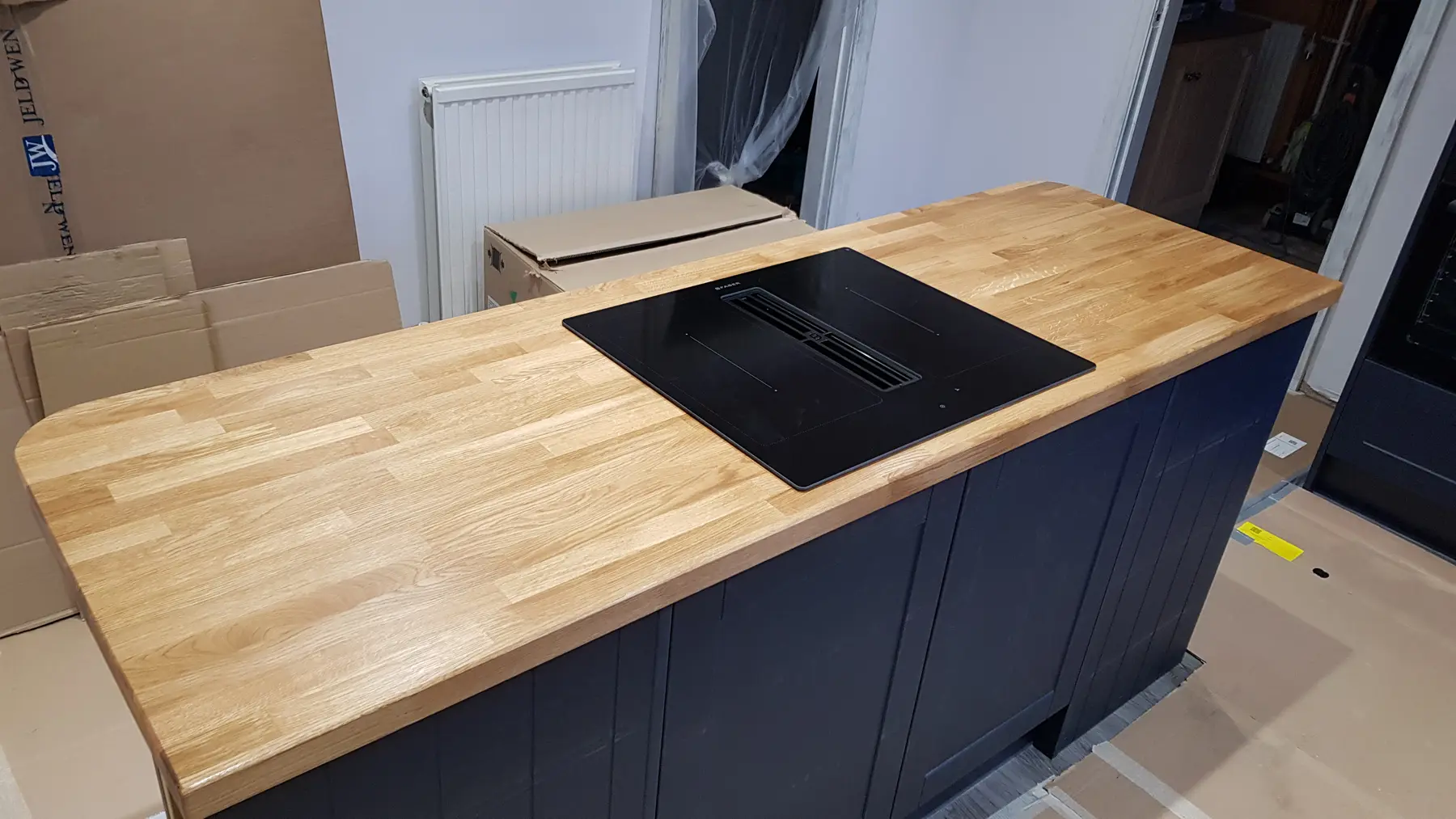 Kitchen island installation in progress