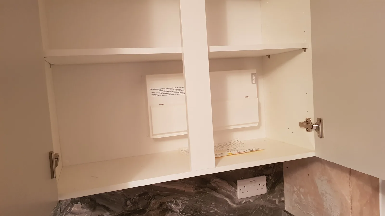 Electrical access inside wall cabinets