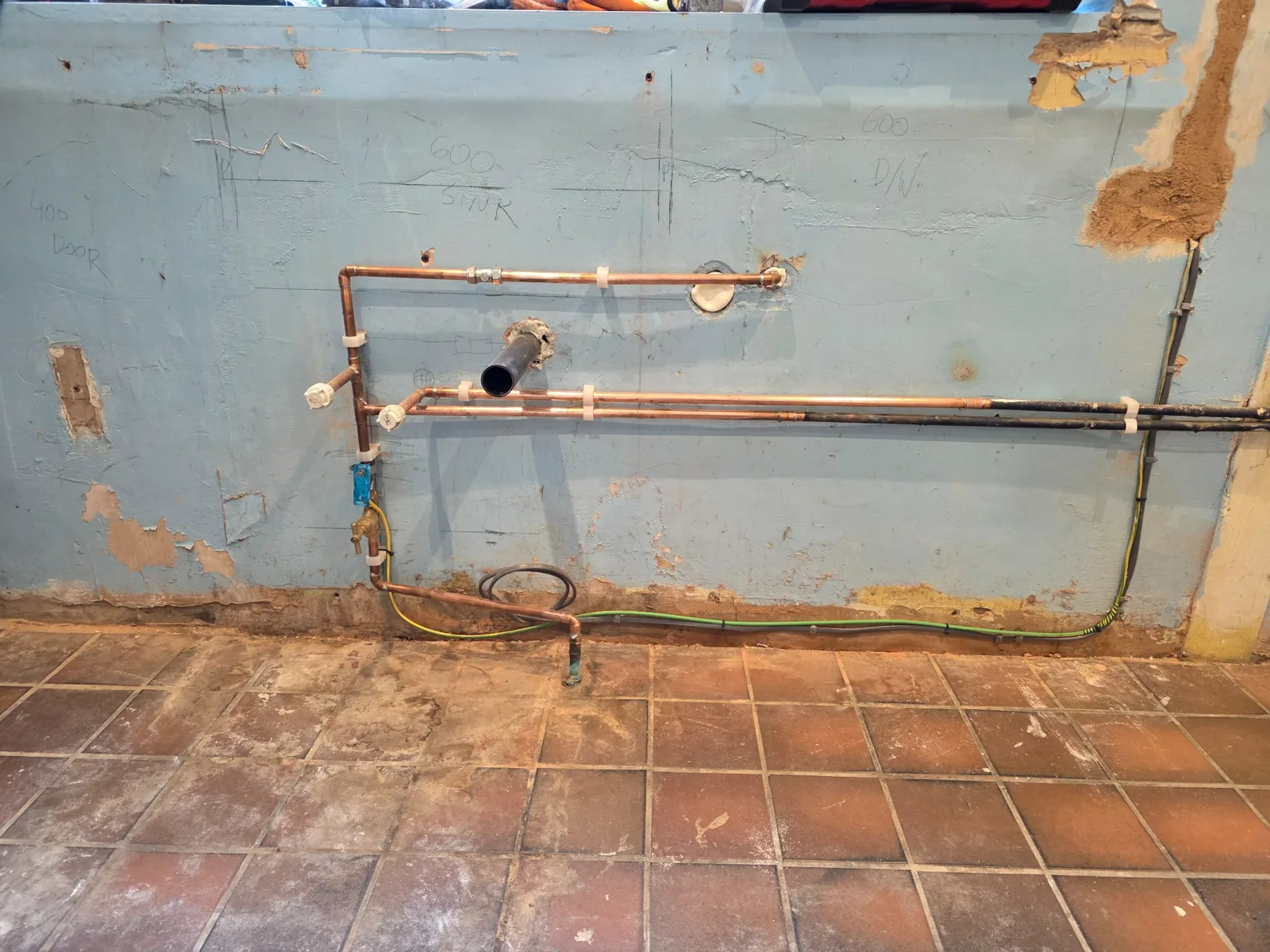 Pipework before kitchen installation