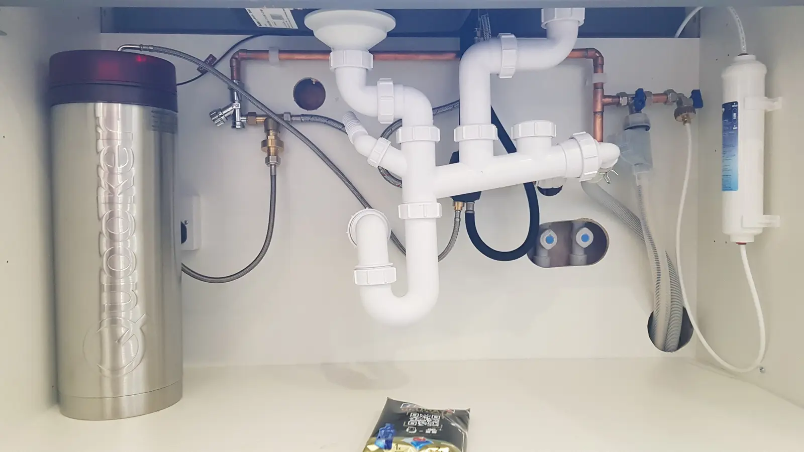 Under-sink plumbing detail