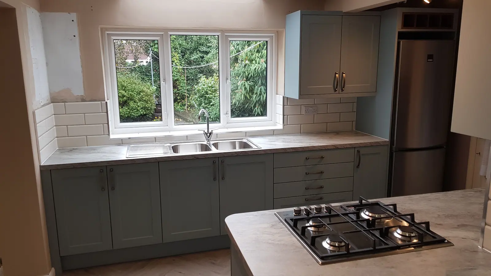 Sage shaker kitchen and island